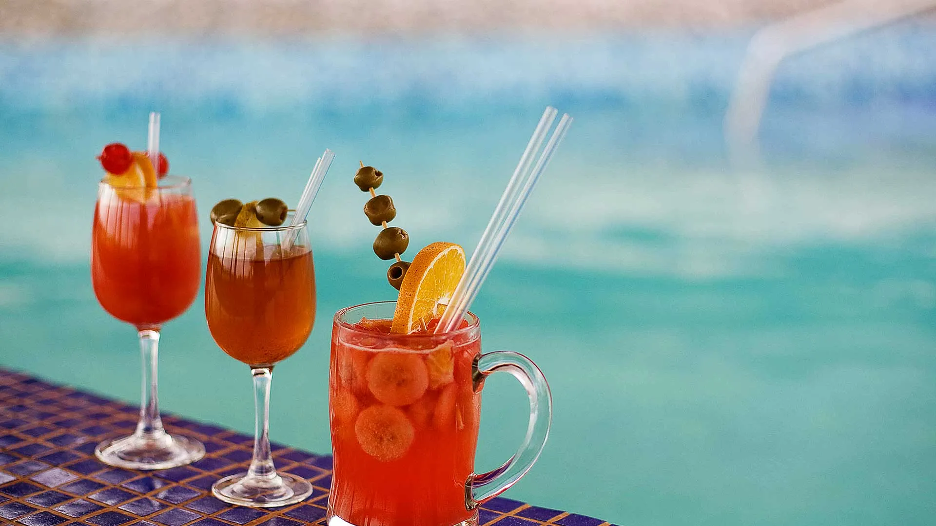 cocktails-by-the-pool85eb9012-d1c1-2c9a-f0e7-3e75d897aee4.webp